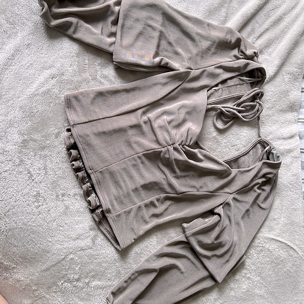 Size small, grey long sleeve crop top. Good for girls night or even date night:)